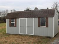 Pine Creek 12x20 HD Dutch Barn with Light Gray walls, White trim and Chestnut shutters, and Barkwood shingles