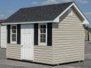 8x12 Cape Cod Style Storage Shed with Vinyl Siding and Shingle Roof